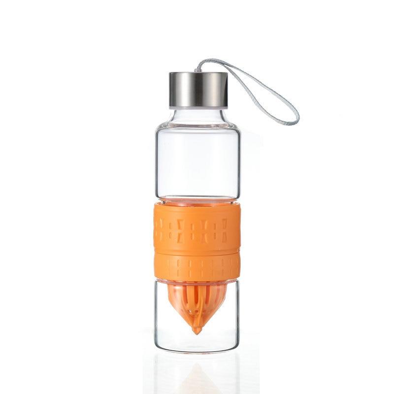 Bouteille en verre presse agrume orange